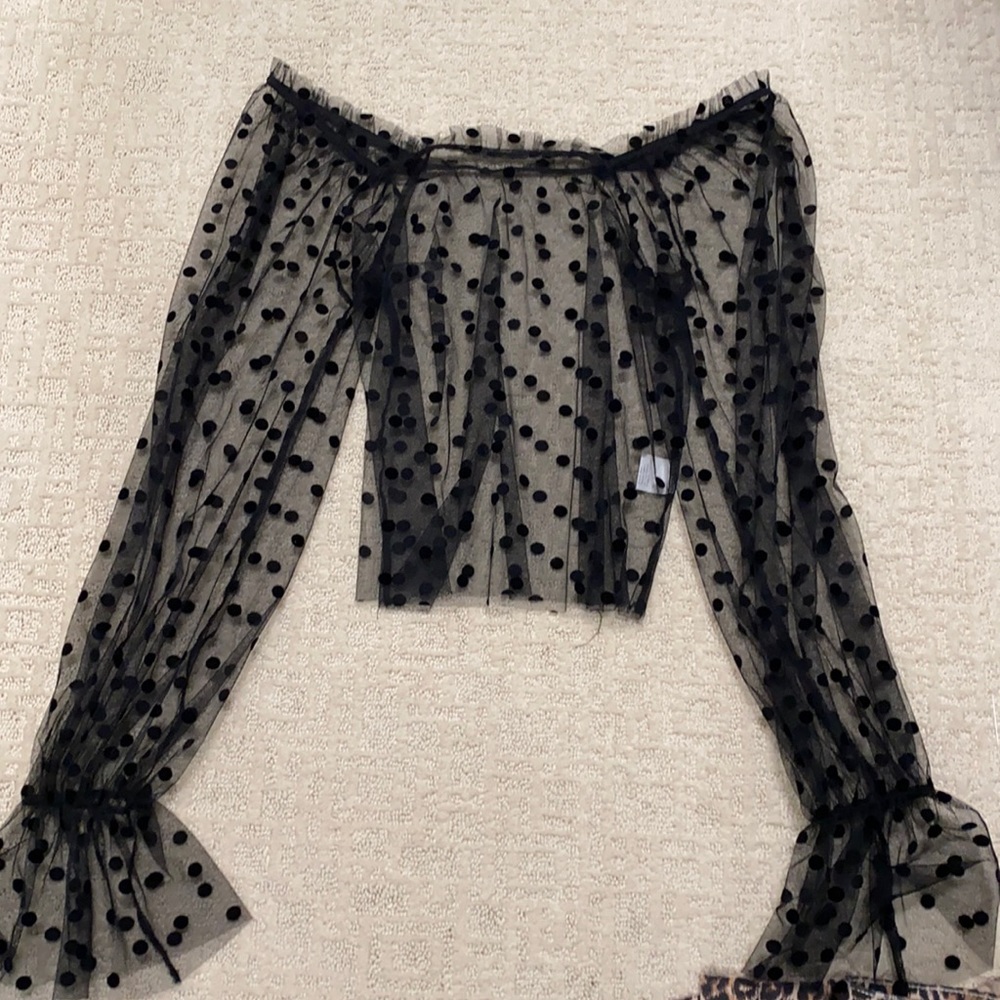 See through black polka dot top